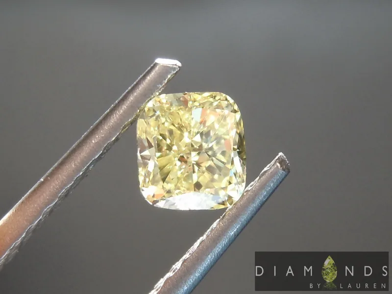 0.69ct Fancy Yellow VS2 Cushion Cut Diamond R6870