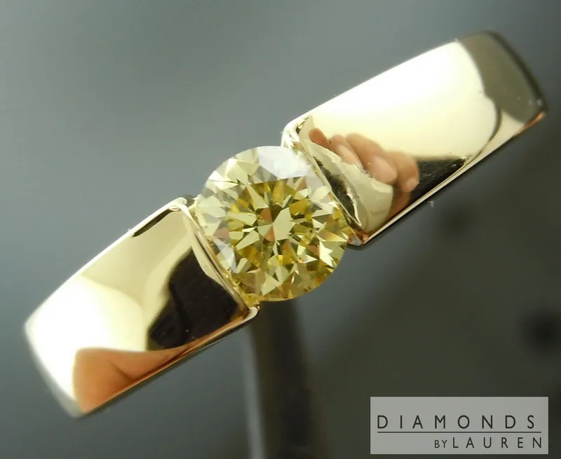0.59ct Fancy Yellow SI2 Round Brilliant Diamond Ring R7278
