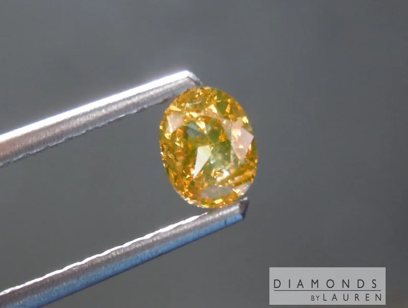 0.65ct Orange Yellow SI2 Oval Diamond R7567